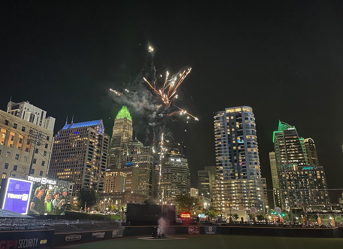 Contact - Charlotte, North Carolina Skyline at Night, Fireworks Exploding in the Air